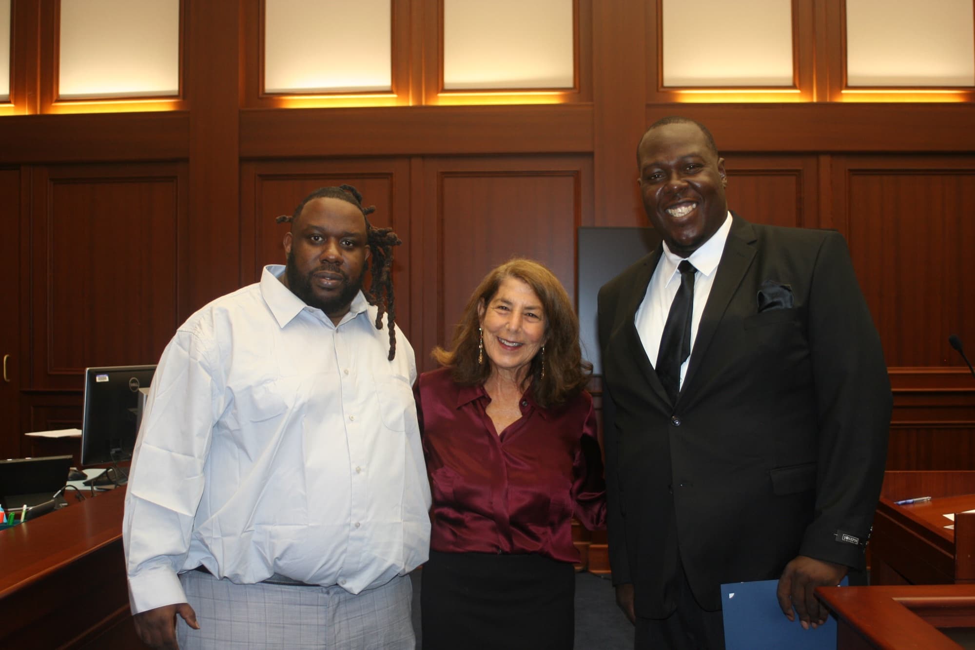 Accountability court participants and a court leader celebrating a milestone